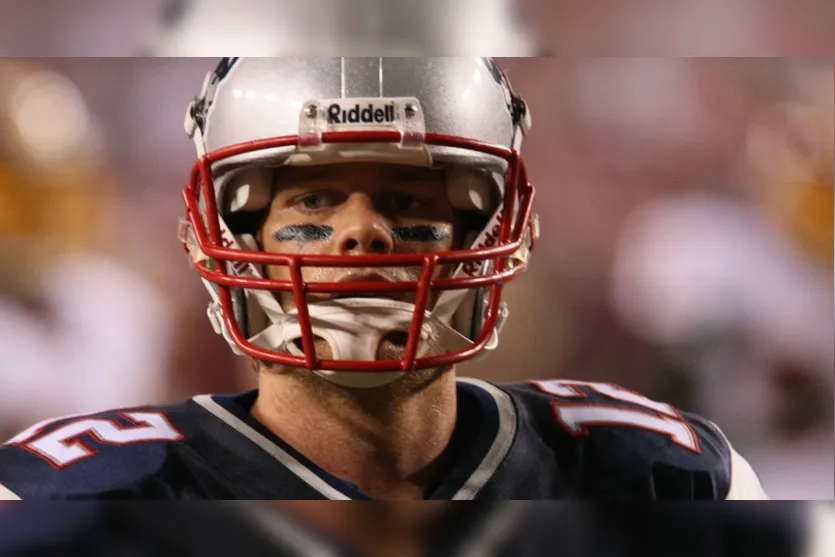  Tom Brady enquanto quarterback dos Patriots em jogo contra os Washington Redskins, no ano de 2009 